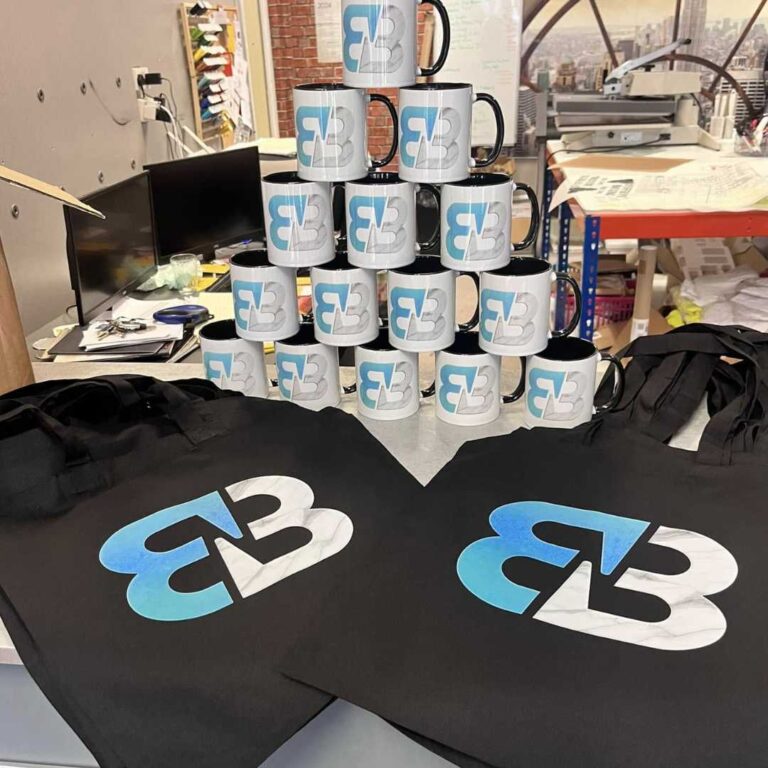 persoanalised branded merch items for event exhibition north west wales affordable high quality logo flyers bvusinesss cards posters signs migs pens lanyards bags mugs
