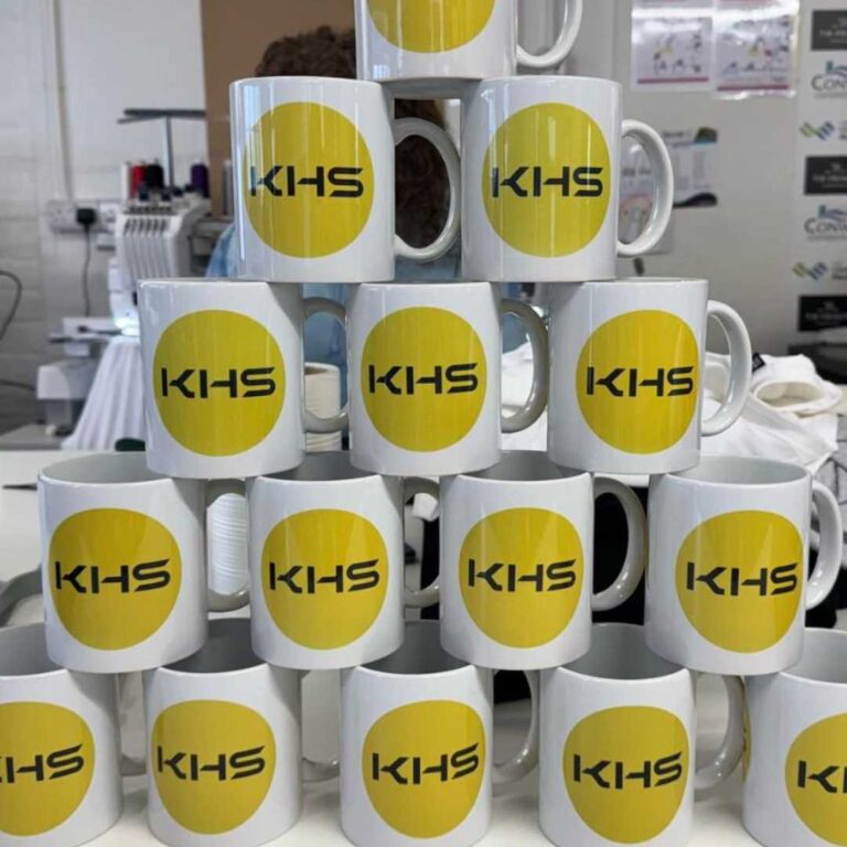 persoanalised branded merch items for event exhibition north west wales affordable high quality logo flyers bvusinesss cards posters signs migs pens lanyards mugs