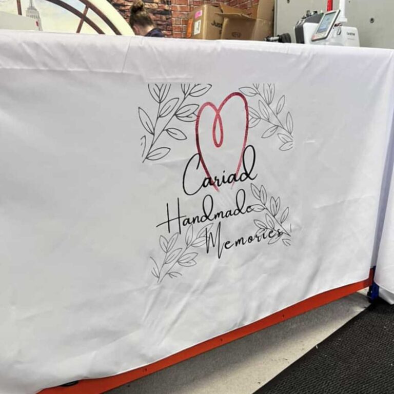 persoanalised branded merch items for event exhibition north west wales affordable high quality logo flyers bvusinesss cards posters signs migs pens lanyards table cloth